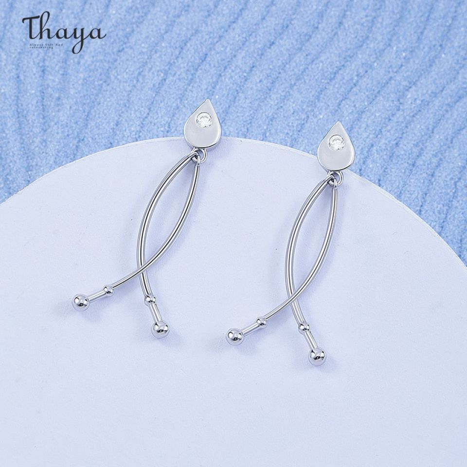 Fish Fin Cross Earrings H89ccc91ba6914447861c197f1306456fl 04ecb609