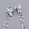 Moon Jellyfish Tassel Earrings S0e2c05f123c646468329fb72ef09ce1eo b18746ca