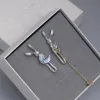 Moon Bunny Asymmetrical Earrings S34e4139998d0477e9575d0856724f4a9I cfc4ba7c